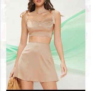 Satin crop top and mini skirt set. Brand new